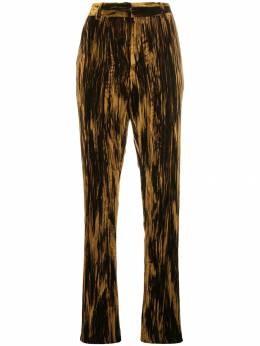 Saint Laurent: Золотые брюки 