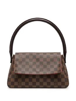 Louis Vuitton: Коричневая сумка 