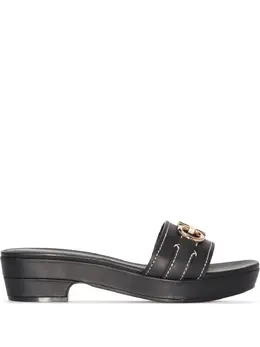 Salvatore Ferragamo: Чёрные сабо  Gancini