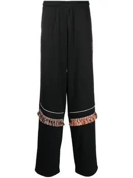 Marcelo Burlon County of Milan: Брюки бахромой 