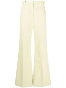 Victoria Beckham: Расклешённые брюки 