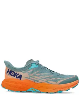 Hoka One One: Оранжевые кроссовки 