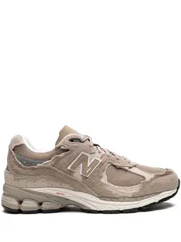 New Balance: Бежевые кроссовки 
