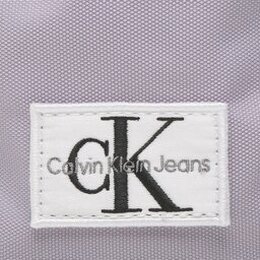 Calvin Klein Jeans: Фиолетовая сумка