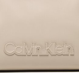 Calvin Klein: Бежевая сумка