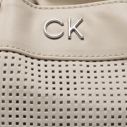 Calvin Klein: Бежевая сумка