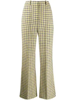Victoria Beckham: Расклешённые брюки 