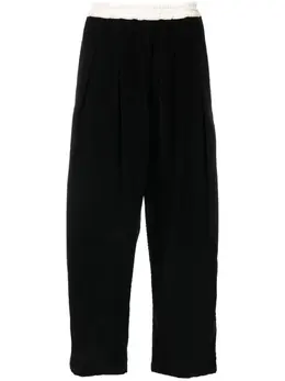 Maison Margiela: Чёрные брюки 
