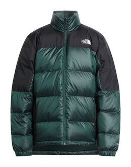 THE NORTH FACE: Стёганые куртка 