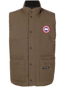 Canada Goose: Коричневый жилет  Garson