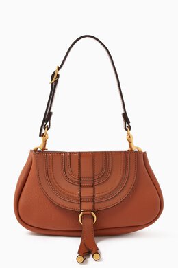 Chloé: Коричневая сумка Marcie