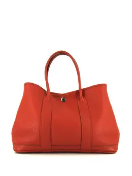 Hermès: Красная сумка-шоппер 