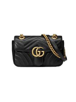 Gucci: Чёрная сумка  GG Marmont