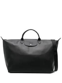 Longchamp: Чёрная дорожная сумка  Le Pliage Travel