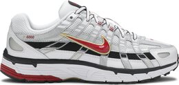 Nike: Серебристые кроссовки 
