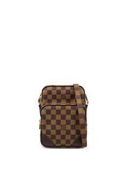 Louis Vuitton: Коричневая сумка 
