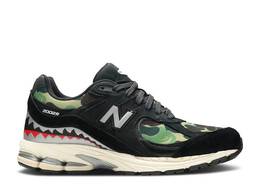 New Balance: Чёрные кроссовки  2002R