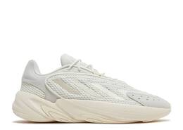 Adidas: Белые кроссовки  Ozelia