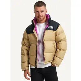 The North Face: Бежевый пуховик 