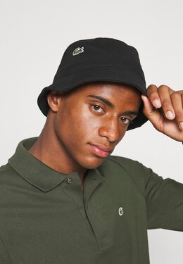 Lacoste: Чёрная шапка 