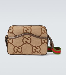 Gucci: Бежевая сумка  GG