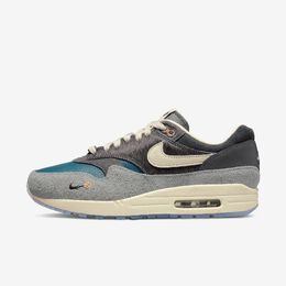 Nike: Серые кроссовки Air Max 1 SP