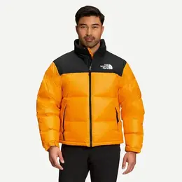 The North Face: Оранжевый пуховик 