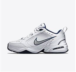 Nike: Белые кроссовки Air Monarch IV