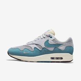 Nike: Серебристые кроссовки Air Max 1