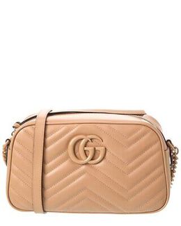 Gucci: Бежевая сумка GG Marmont