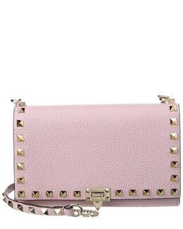 Valentino: Фиолетовая сумка Rockstud