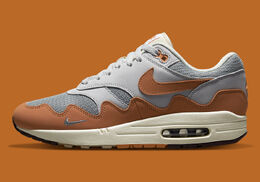 Nike: Оранжевые кроссовки Air Max 1