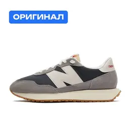 New Balance: Серые кроссовки 