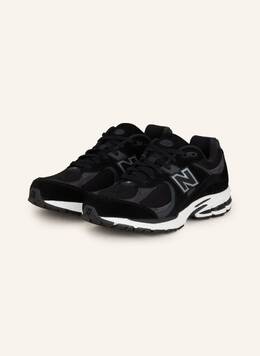 New Balance: Чёрные кроссовки  2002R