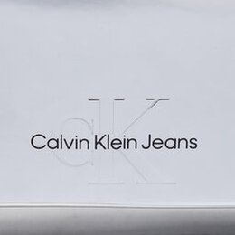 Calvin Klein Jeans: Серебристая сумка