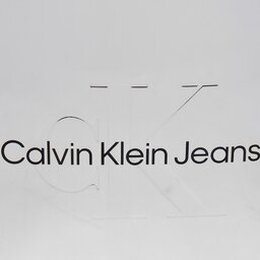 Calvin Klein Jeans: Серебристая сумка