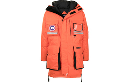 Canada Goose: Оранжевый пуховик 