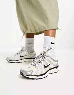Nike: Бежевые кроссовки 