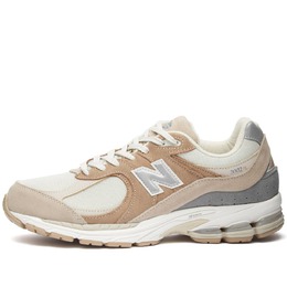 New Balance: Серые кроссовки 