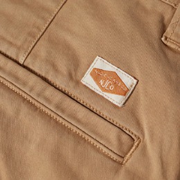 Nudie Jeans Co: Бежевые брюки  Easy Alvin