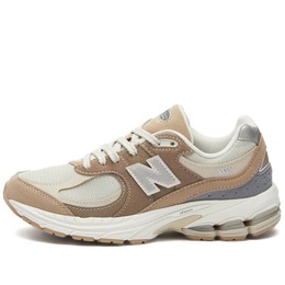 New Balance: Бежевые кроссовки  2002R