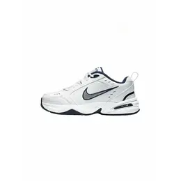 NIKE: Белые кроссовки Air Monarch IV