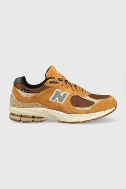 New Balance: Коричневые кроссовки 