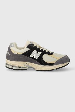 New Balance: Серые кроссовки 