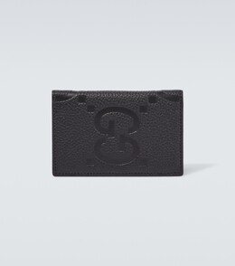 Gucci: Чёрная обложка  GG