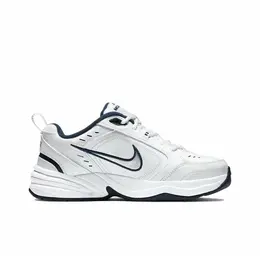 NIKE: Белые кроссовки Air Monarch IV