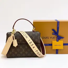 LOUIS VUITTON: Коричневая сумка 