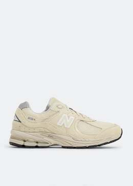 New Balance: Бежевые кроссовки  2002R