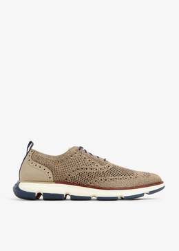 Cole Haan: Бежевые кроссовки 