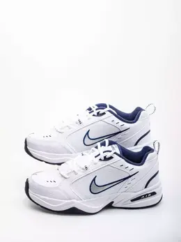 Nike: Белые кроссовки Air Monarch IV